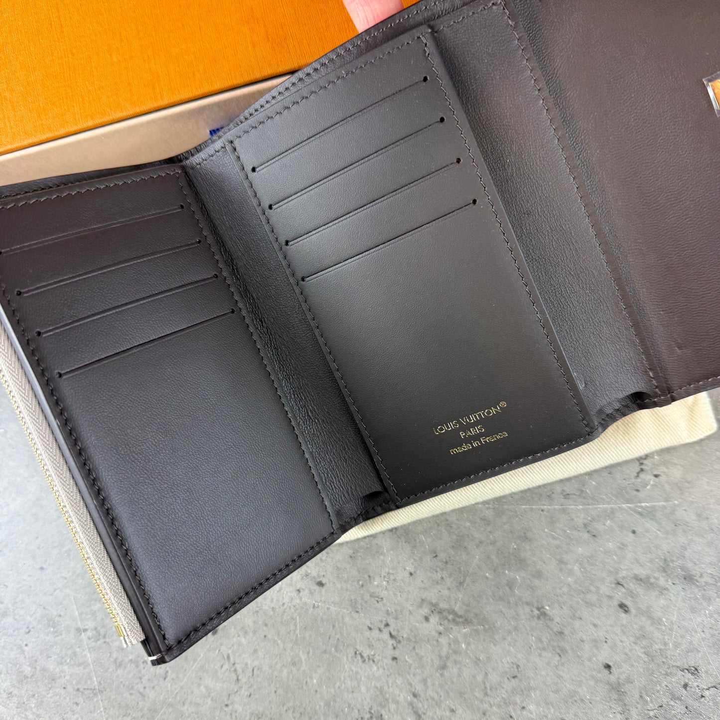 Capuncies Compact Purse
