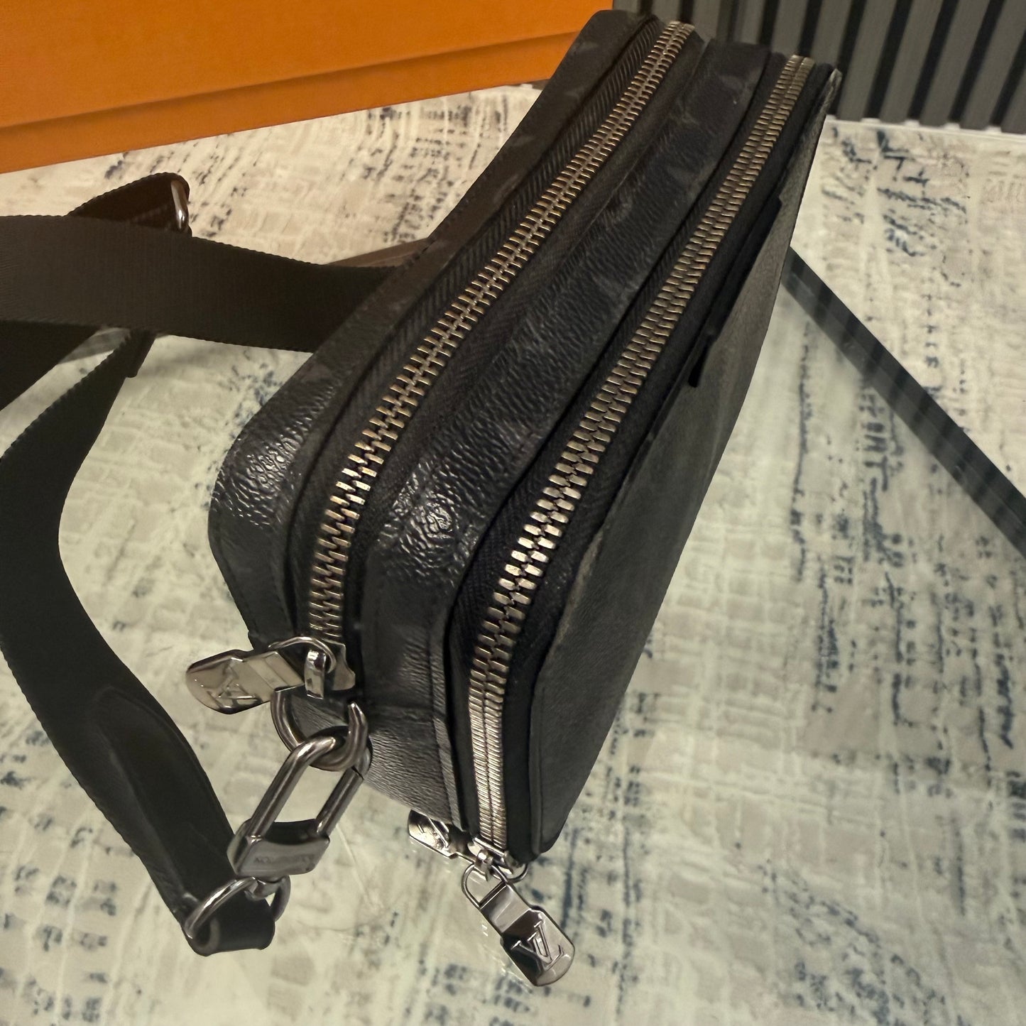 Monogram Eclipse Alpha Messenger